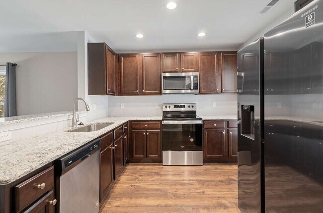 Building Photo - Charming 2-Bed Townhouse Retreat with 2.5 Baths in Clayton - 1212 Sq Ft of Comfort!