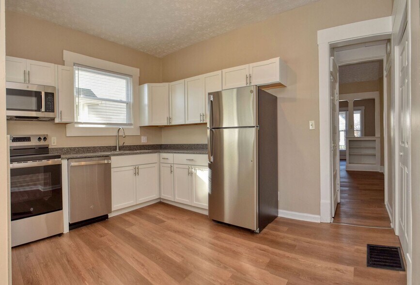 Building Photo - Bates-Hendricks/Newly Remodeled 3 Bedroom Half Double