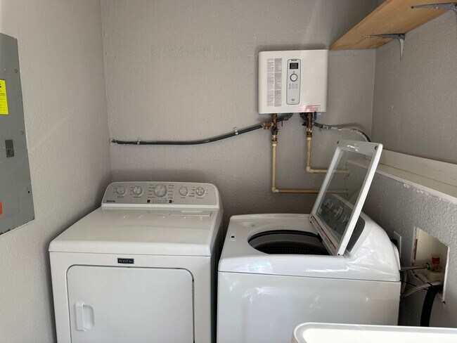 Building Photo - Water Access Living with Detached Garage & Spacious Comfort