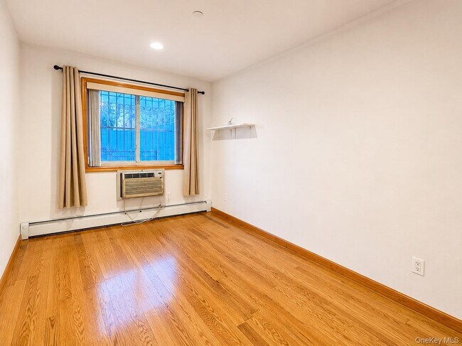 Building Photo - 65-44 Woodside Ave