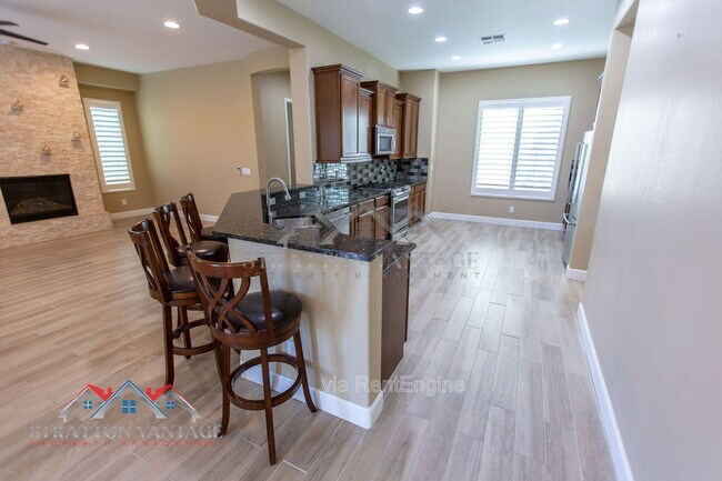 Building Photo - 5908 E Bramble Berry Ln