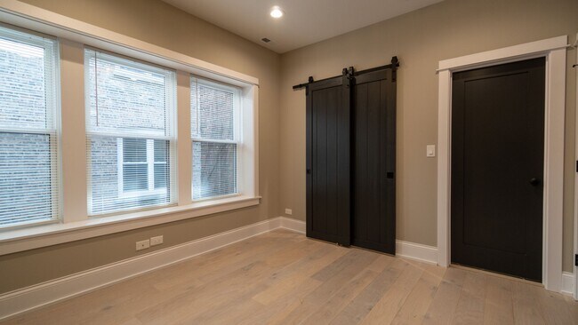 Building Photo - Newly Rehabbed 3-bedroom, 2-bath Gem with In-Unit Washer/Dryer! Discover Uptown Living.