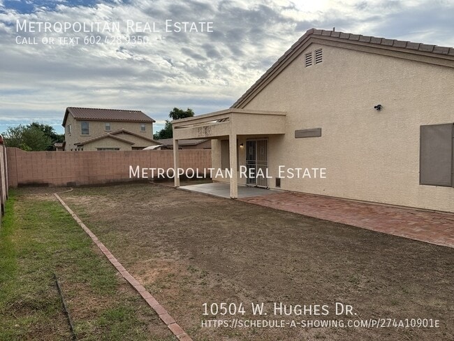 Building Photo - 10504 W Hughes Dr