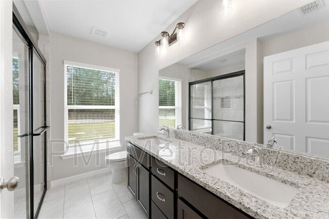 Building Photo - 9461 N Sandree Dr