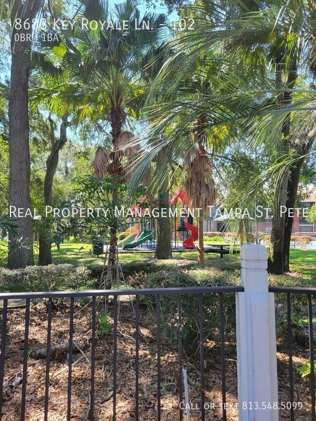 Building Photo - 8683 Key Royale Ln