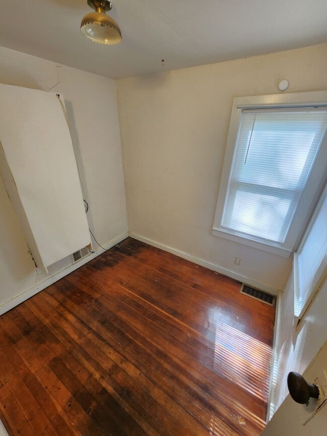 Building Photo - Nice home with oversized 2car gar with work bench and large shaded yard. Country-like setting