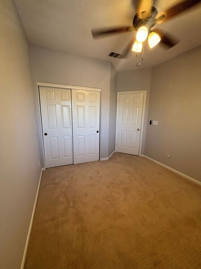 Building Photo - Gated Green Valley Ranch Townhome | 2 Bed | 2.5 Bath | 2-Car Garage