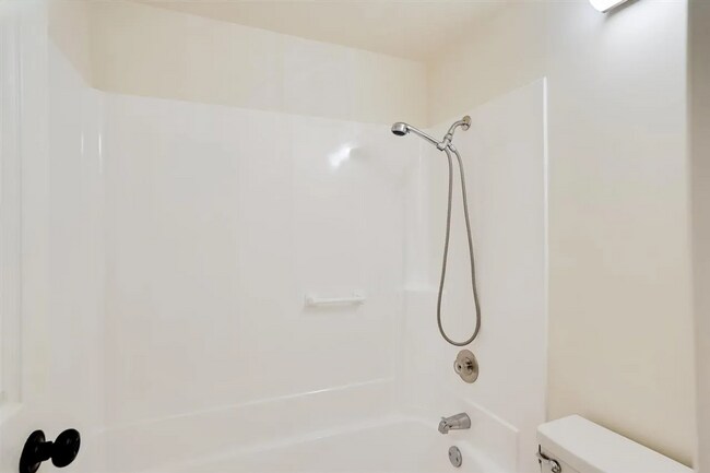 Building Photo - Spacious 1,550 Sq Ft Townhome | 2-Car Garage & High Ceilings w/ Exposed Beams