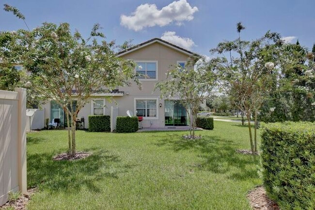 Building Photo - Elegant 2/2.5 Townhome in Guard-Gated Eagl...