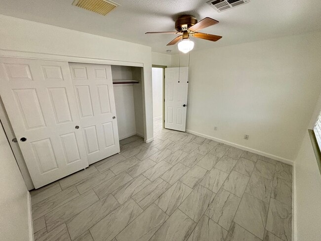 Building Photo - This inviting single-story home boasts a s...