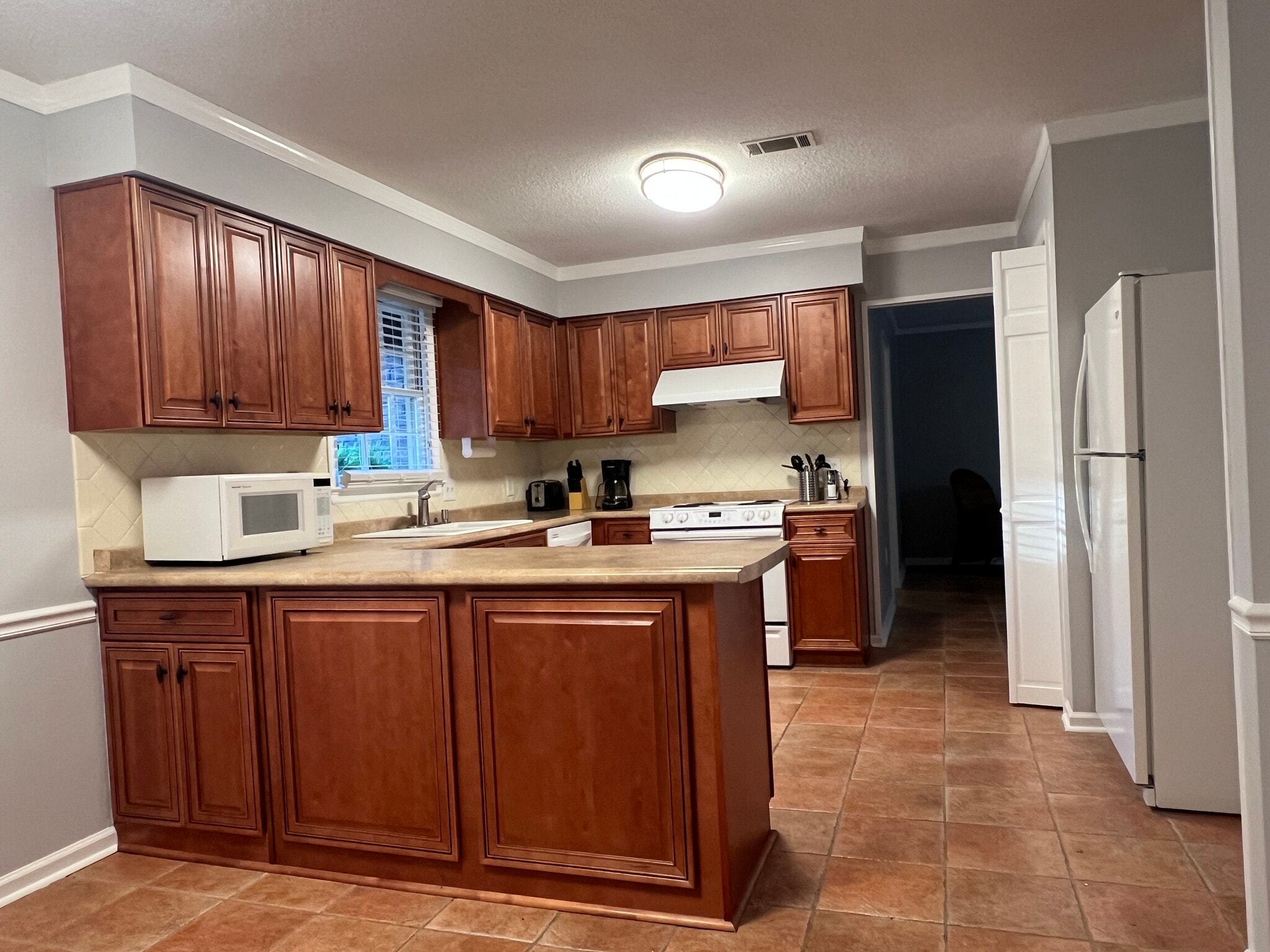 Another view the kitchen - 902 Penn Waller Rd