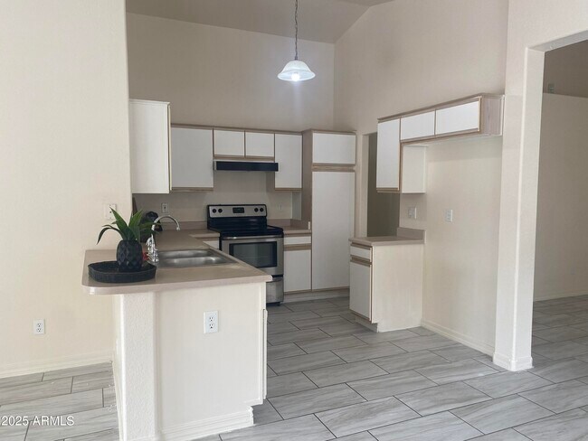 Building Photo - 8563 W Mission Ln