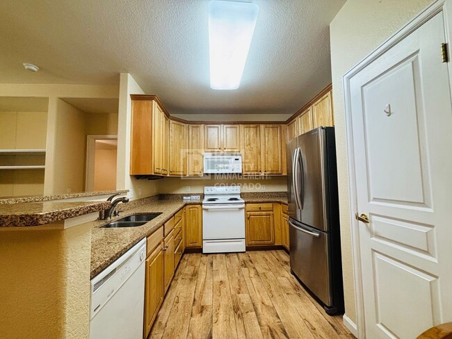 Building Photo - 10341 W Girton Dr