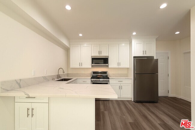 Building Photo - 5244 Whitsett Ave