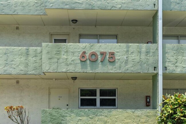 Building Photo - 6075 N Sabal Palm Blvd