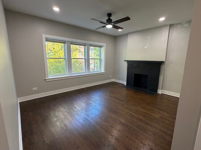 Building Photo - 7823 S Colfax Ave