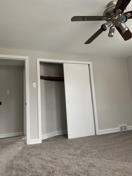 Main bedroom. Sliding closet doors. - 1310 W Kings Hwy