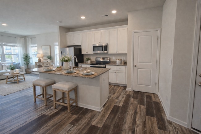 Building Photo - COMING SOON: 3BR Townhome • Full Kitchen • Garage + Driveway