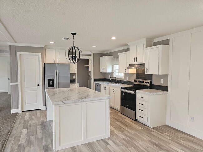 Building Photo - Welcome Home! Spacious 3-Bed, 2-Bath Split Floor Plan on ¾ Acre Lot