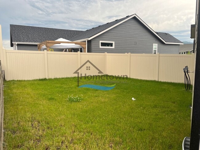 Building Photo - Woodbridge South Home with 4 Bedrooms and 3 Bathrooms in Post Falls build in 2021!