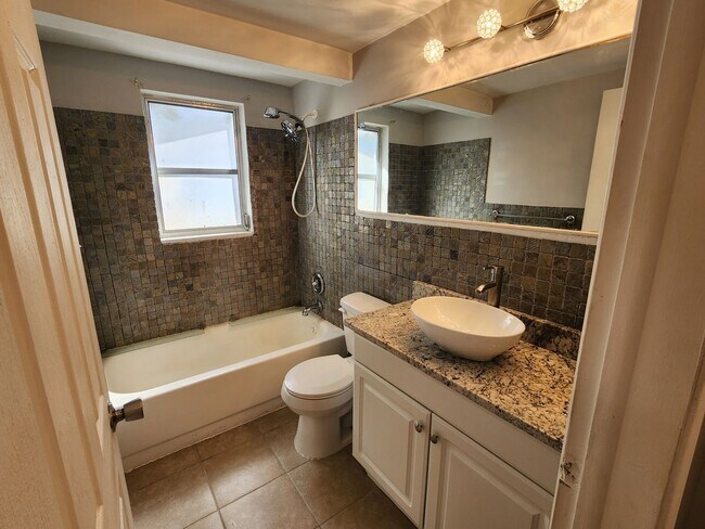 Building Photo - 3/2/1 1508 Sq. Ft. LARGE Corner Lot home: Updated Kitchen & Baths, NEW paint, NEW floors, Fenced ...