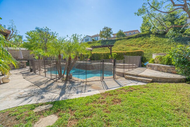 Building Photo - Spectacular 5-Bedroom Home with Private Po...