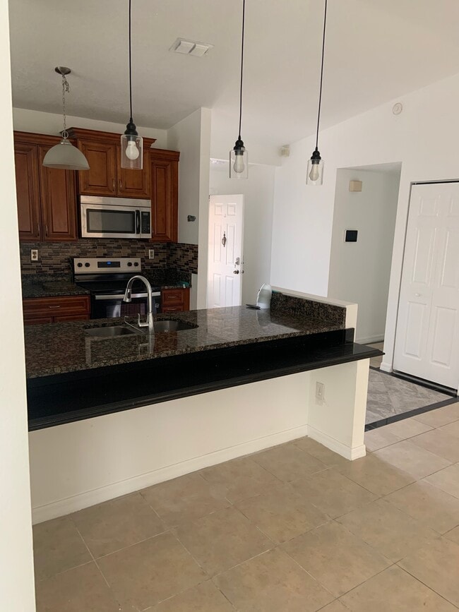 Building Photo - 7785 Murcott Cir