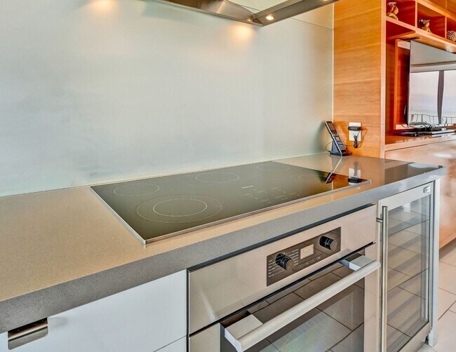Building Photo - Designer Luxury. Iconic Views. Extraordinary Living.