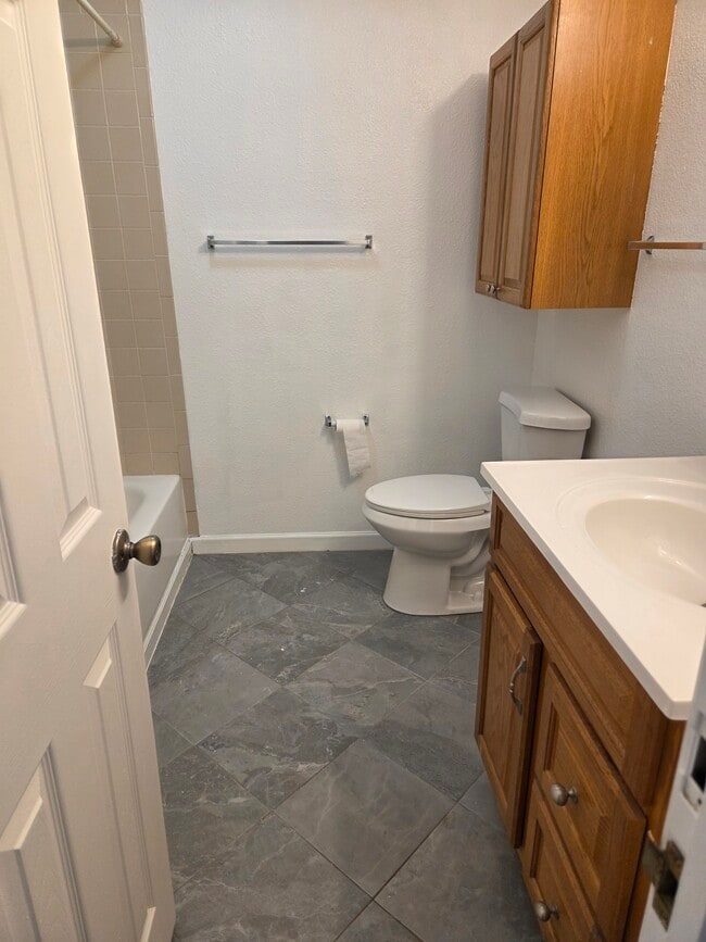 Building Photo - Stonecreek Park Condominiums