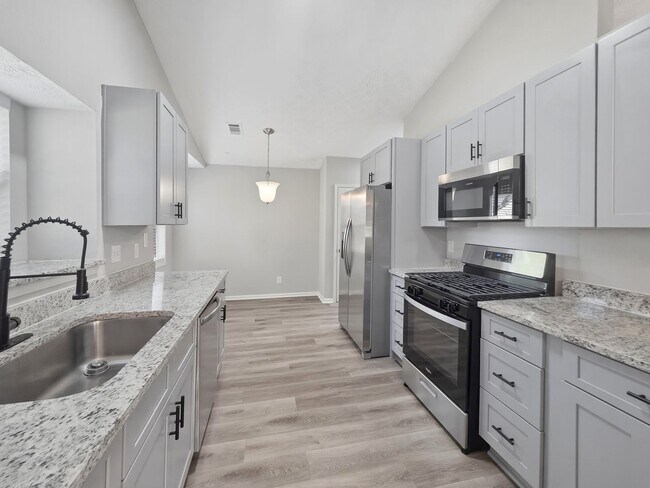 Building Photo - Charming Updated Ranch on Cul-de-Sac with Designer Finishes in Prime Kennesaw Location