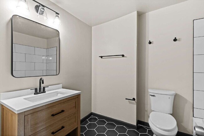 Building Photo - For Rent: Renovated 2-Story Townhouse in M...