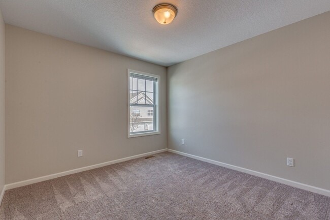 Building Photo - End Unit Town Home avail April 2026 : 3bd2ba2car garage Zimmerman