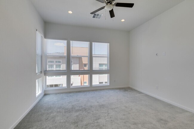 Building Photo - Stunning 4-Level Townhome in Inspirada | R...