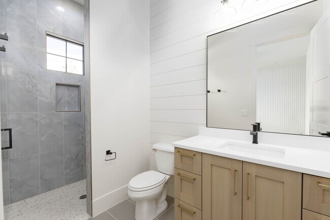 Building Photo - Gorgeous Custom Single Story with RV Garage