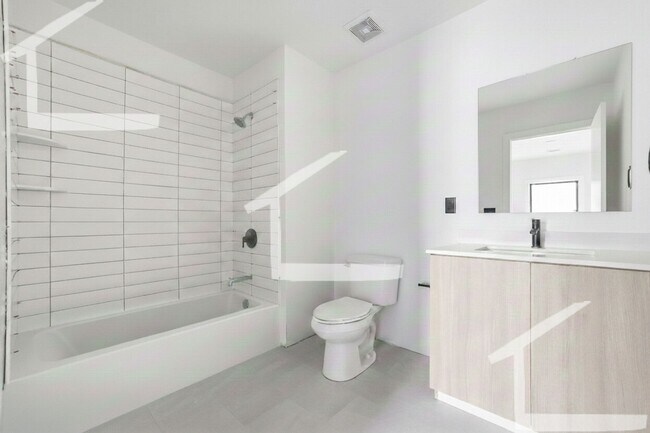 Building Photo - Beautiful 1Br/1Bth NEW CONSTRUCTION apartment!  Laundry in unit! Great locations!