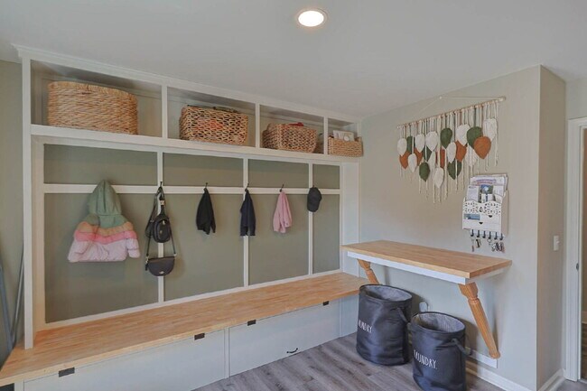 Building Photo - COMING SOON · Designer Renovation · Covered Deck Pavilion · 2-Car Garage · Lawn Care Included