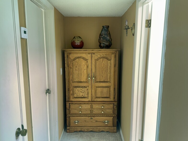 Guest Quarters Hallway with Armoir - 150 E Los Mangos