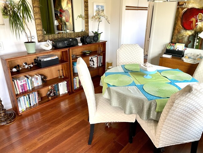 Dining room and bookshelves full of books - 250 Vista Montana Way