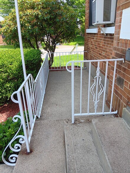 Newly Painted Front Poorch Rails-Left Side - 4525 Roth Ave