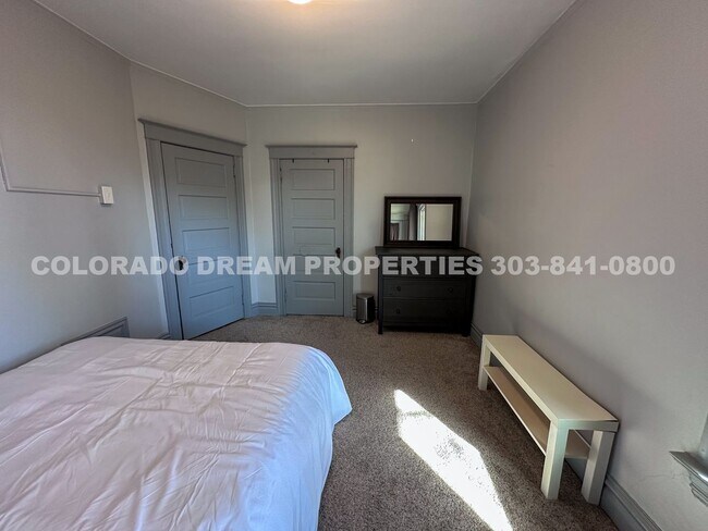 Building Photo - A home where old-world charm meets modern sophistication!