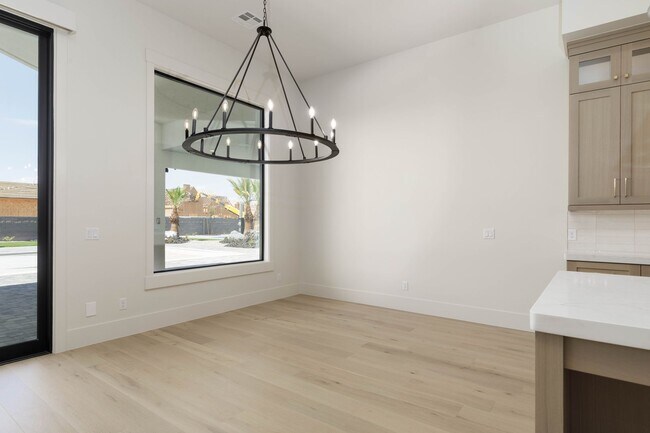 Building Photo - Gorgeous Custom Single Story with RV Garage