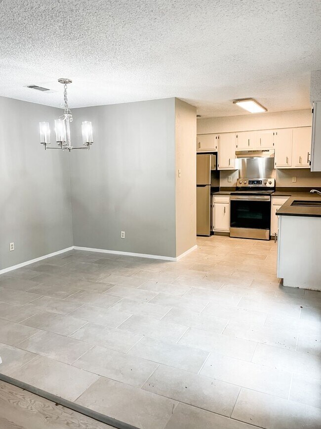 Building Photo - Pet Friendly 3/2 on Shady Fenced Lot w/ Fi...
