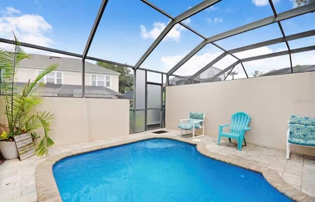 Building Photo - 8117 Princess Palm Ln