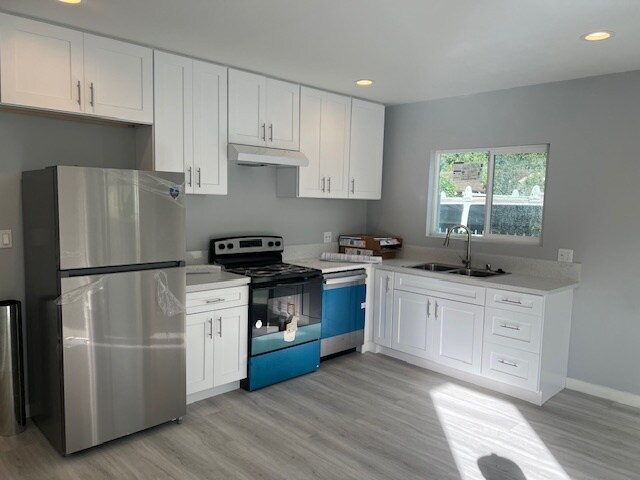 Building Photo - 3937 Denker Ave