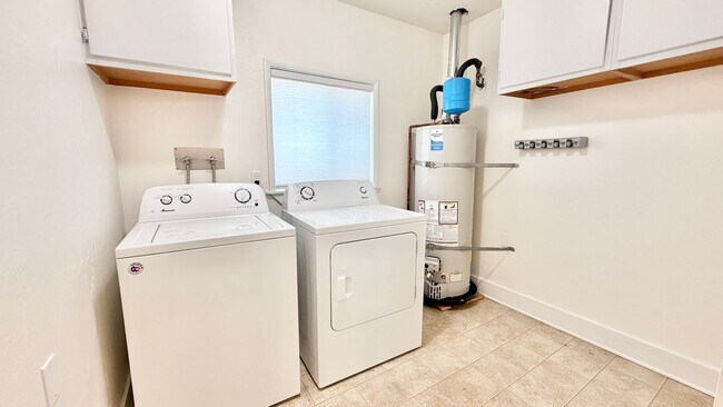 Building Photo - Beautiful Craftsman-style Home with fenced yard space, detached garage and additional parking in ...