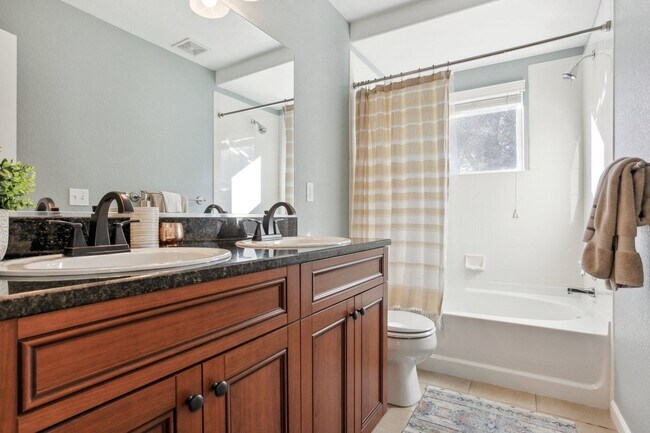 Building Photo - Arvada Townhome with Serene Lake Views