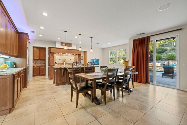 Building Photo - Luxurious 5-Bedroom Pool Home with Solar &...