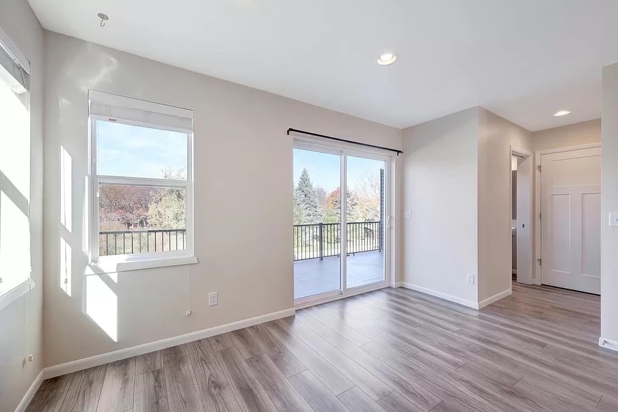 Dining area with porch walkout (guest 1/2 bath, storage, and laundry room to right) - 5856 Lien Rd
