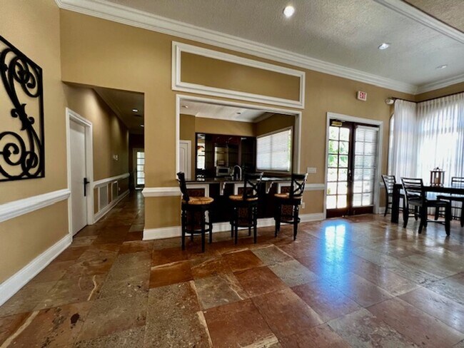 Building Photo - NEW-Remodeled bathroom & kitchen! NEW VINYL PLANK flooring & fresh paint! 2 bedroom 1 bath condo ...