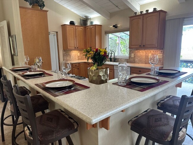 Building Photo - Sunny - Fully Furnished 2-Bedroom, with Office and 2 1/2 bathrooms.